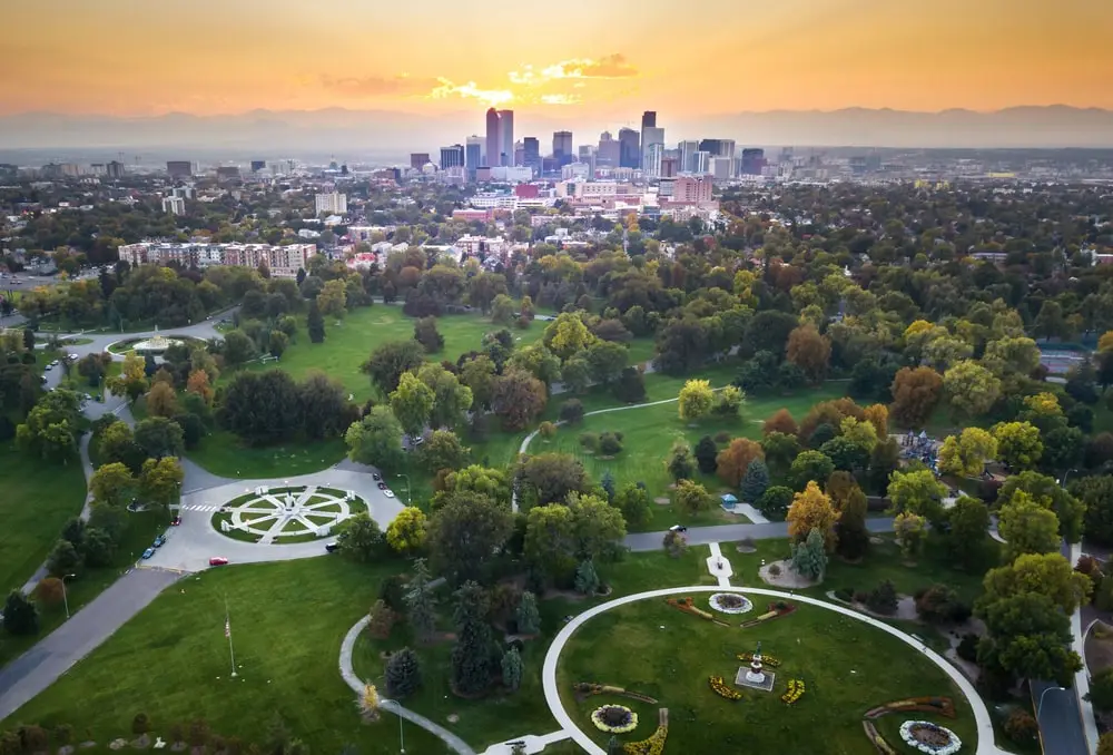 An aerial view from a city park at sunset over Denver.