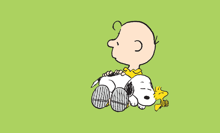 Charlie Brown hugging Snoopy